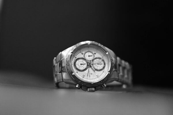 Elegant Silver Chronograph Watch on a Dark Surface