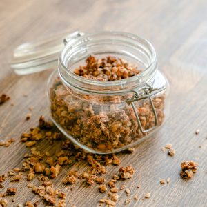 pexels-photo-4397315-4397315 Homemade granola spilling from a glass jar, perfect snack idea.